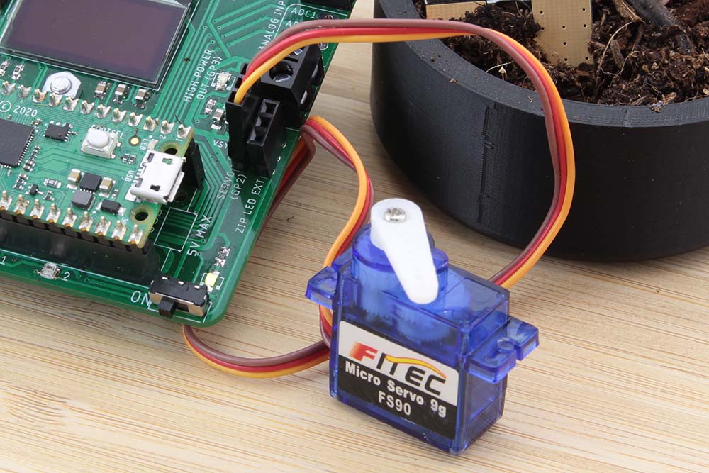 Close up image of mini servo connected to main board